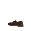 Brown Calf Leather Bos Taurus Slip-On LoafersSaint Laurent’s Cassandre Loafers combine comfort and sophistication in an elegant design. Made of soft leather, they are embellished with the gold metal Cassandre decoration and hand-stitched moc toe, a sign o