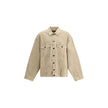 Beige Cotton Denim JacketThe oversized Denim Jacket by Balenciaga features a 7-button closure, front flap pockets and side slit pockets. Adjustable cuffs and waist with Balenciaga engraved metal buttons. The embroidered logo on the back elegantly signs th