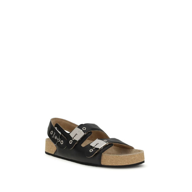 Black Calf Leather Bos Taurus Flat SandalsBalenciaga’s Scholl Flat Sandals, made of calfskin leather, are the result of a collaboration between the two brands and blend comfort and contemporary style. They feature three adjustable straps with metal buckle