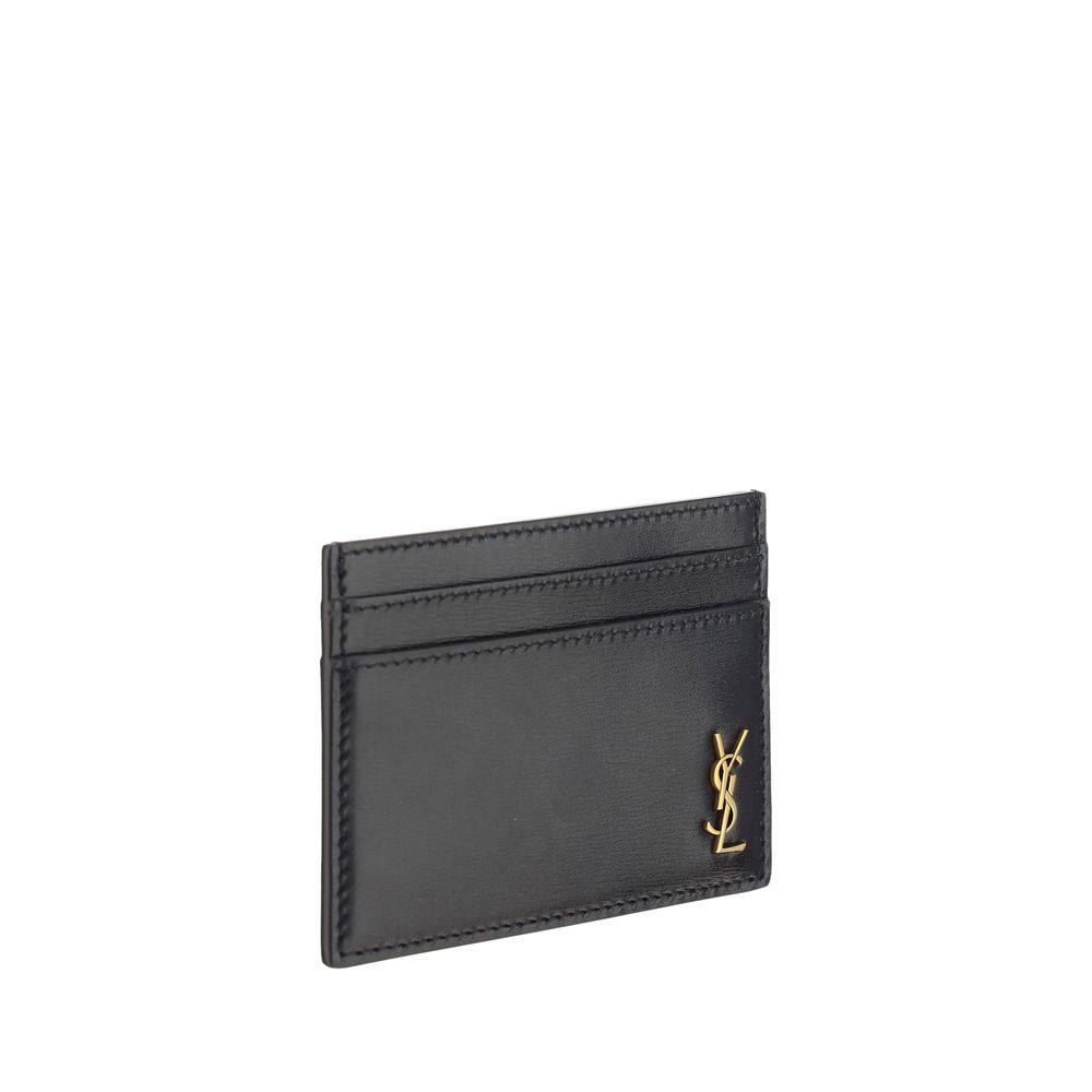 Black Calf Leather Bos Taurus WalletCalfskin Card Holder by Saint Laurent, card slots on both sides, embossed brass logo on front. Season: AW25 Dimension: 12×12 Composition: 100% Calf Leather Bos Taurus MADE IN ITALYBlack Calf Leather Bos Taurus Wallet${t