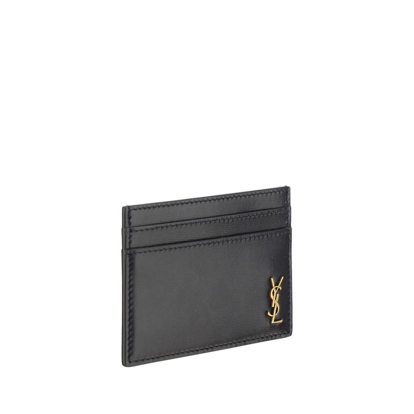 Black Calf Leather Bos Taurus WalletCalfskin Card Holder by Saint Laurent, card slots on both sides, embossed brass logo on front. Season: AW25 Dimension: 12×12 Composition: 100% Calf Leather Bos Taurus MADE IN ITALYBlack Calf Leather Bos Taurus Wallet${t