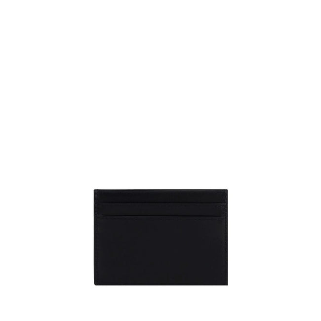 Black Calf Leather Bos Taurus WalletCalfskin Card Holder by Saint Laurent, card slots on front and back, logo plaque on front. Season: AW25 Dimension: 11×11 Composition: 100% Calf Leather Bos Taurus MADE IN ITALYBlack Calf Leather Bos Taurus Wallet${tagsS