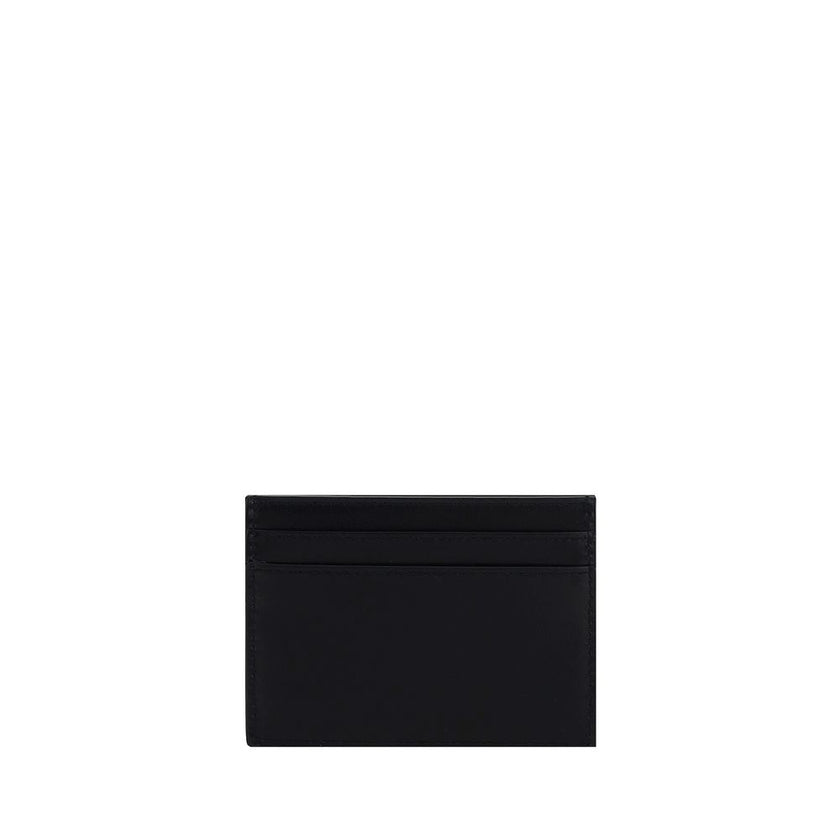 Black Calf Leather Bos Taurus WalletCalfskin Card Holder by Saint Laurent, card slots on front and back, logo plaque on front. Season: AW25 Dimension: 11×11 Composition: 100% Calf Leather Bos Taurus MADE IN ITALYBlack Calf Leather Bos Taurus Wallet${tagsS