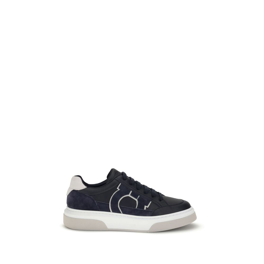 Blue Calf Leather Bos Taurus Low Top SneakersFerragamo’s Gancini leather Sneakers combine retro inspiration with contemporary details. Crafted from leather with suede inserts, they recall classic ’90s basketball shoes. The side inlay with a Gancini silhou