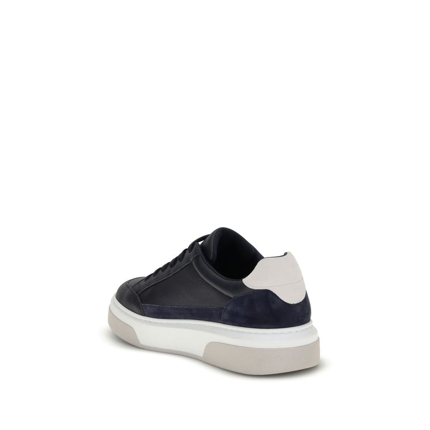 Blue Calf Leather Bos Taurus Low Top SneakersFerragamo’s Gancini leather Sneakers combine retro inspiration with contemporary details. Crafted from leather with suede inserts, they recall classic ’90s basketball shoes. The side inlay with a Gancini silhou