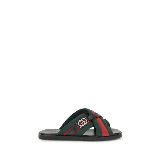 Black Polyamide Flat SandalsGucci’s men’s Web Sandals with Interlocking GG are crafted from the iconic green and red Web fabric, evoking the House’s equestrian roots. The elegant design is enhanced by the silver-tone Interlocking GG logo, adding a touch o