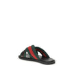 Black Polyamide Flat SandalsGucci’s men’s Web Sandals with Interlocking GG are crafted from the iconic green and red Web fabric, evoking the House’s equestrian roots. The elegant design is enhanced by the silver-tone Interlocking GG logo, adding a touch o