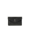 Black Calf Leather Bos Taurus Clutch BagThe Cassandre Large Envelope Clutch Bag by Saint Laurent is an elegant design with a front flap embellished with a silver logo. The magnetic snap-button closure ensures practicality, while the interior features a fl