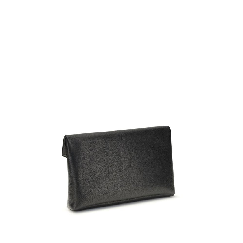 Black Calf Leather Bos Taurus Clutch BagThe Cassandre Large Envelope Clutch Bag by Saint Laurent is an elegant design with a front flap embellished with a silver logo. The magnetic snap-button closure ensures practicality, while the interior features a fl