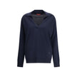 Blue Wool SweatshirtThe Gucci polo Sweater combines relaxed elegance and iconic details. Crafted with a relaxed fit, it features a classic collar and a deep V-neckline that enhance its casual-chic silhouette. The design is completed by long sleeves, ribbe
