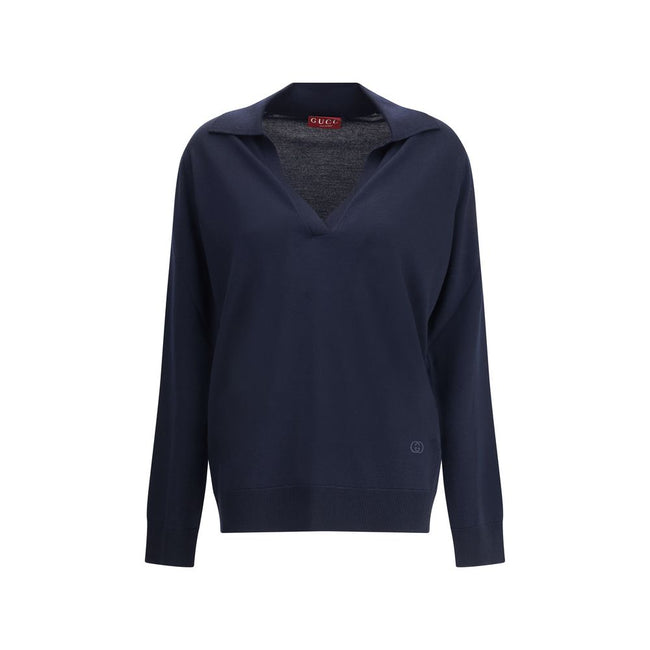 Blue Wool SweatshirtThe Gucci polo Sweater combines relaxed elegance and iconic details. Crafted with a relaxed fit, it features a classic collar and a deep V-neckline that enhance its casual-chic silhouette. The design is completed by long sleeves, ribbe