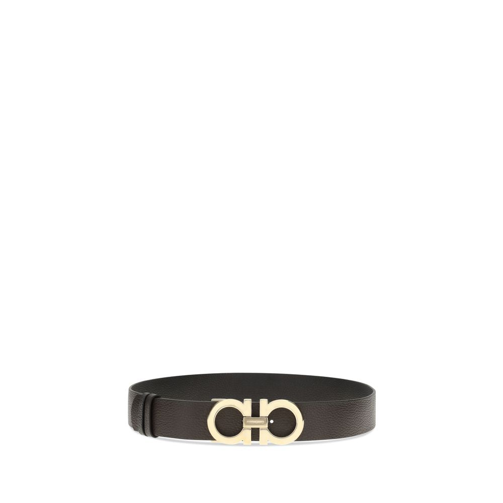 Brown Calf Leather Bos Taurus BeltFerragamo’s reversible leather Belt features a buckle with the iconic Gancini logo, the brand’s distinctive symbol. This belt offers an elegant and versatile design, perfect for completing sophisticated and everyday looks