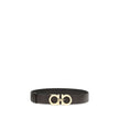 Brown Calf Leather Bos Taurus BeltFerragamo’s reversible leather Belt features a buckle with the iconic Gancini logo, the brand’s distinctive symbol. This belt offers an elegant and versatile design, perfect for completing sophisticated and everyday looks