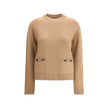 Beige Wool SweatshirtThe Gucci Horsebit Sweater, crafted from premium wool and cashmere, features a ribbed crew neck and long raglan sleeves for optimal comfort. The front features faux welt pockets with elegant gold-tone inserts, while the ribbed hem and
