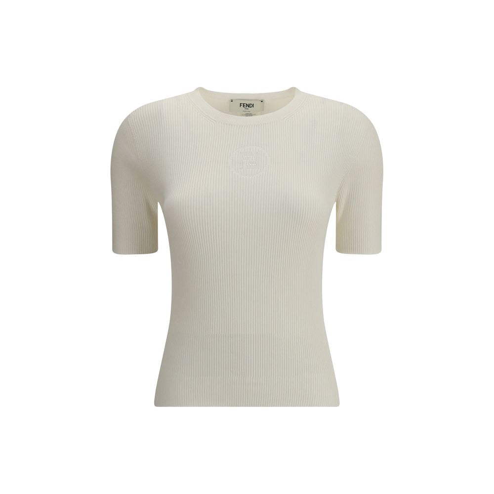 White Silk T-ShirtThe Fendi 1925 T-Shirt is crafted by a refined ribbed knit in silk and vanisé cotton, giving the garment an elegant and light texture. The devoré motif with the Fendi 1925 Stamp stands out on the front, an iconic detail that celebrates t