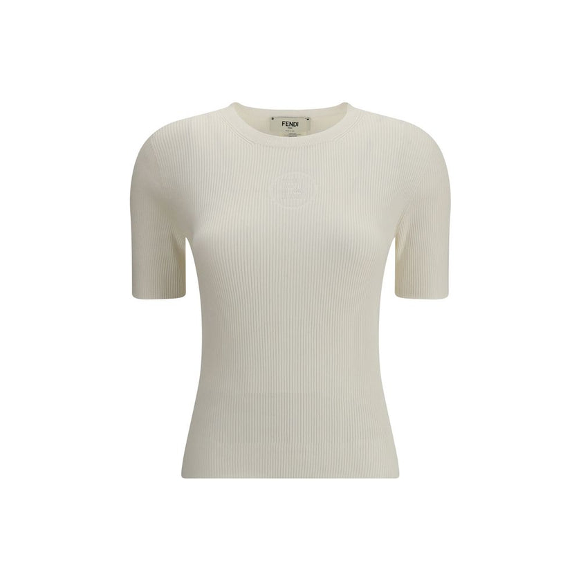 White Silk T-ShirtThe Fendi 1925 T-Shirt is crafted by a refined ribbed knit in silk and vanisé cotton, giving the garment an elegant and light texture. The devoré motif with the Fendi 1925 Stamp stands out on the front, an iconic detail that celebrates t