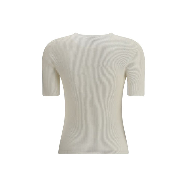 White Silk T-ShirtThe Fendi 1925 T-Shirt is crafted by a refined ribbed knit in silk and vanisé cotton, giving the garment an elegant and light texture. The devoré motif with the Fendi 1925 Stamp stands out on the front, an iconic detail that celebrates t