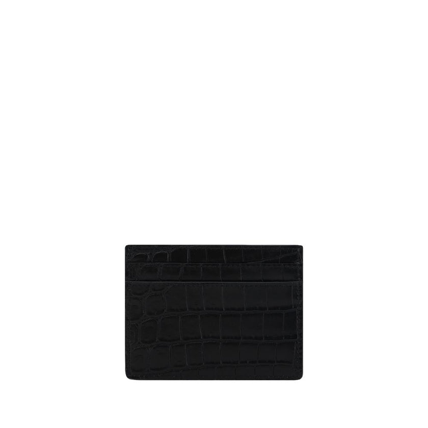Black Calf Leather Bos Taurus WalletCalfskin Card Holder by Saint Laurent, animal-effect leather print, iconic brand monogram press-stamped on front, card slots on front and back, bill compartment at top. Season: AW25 Dimension: 10.5×10.5 Composition: 100