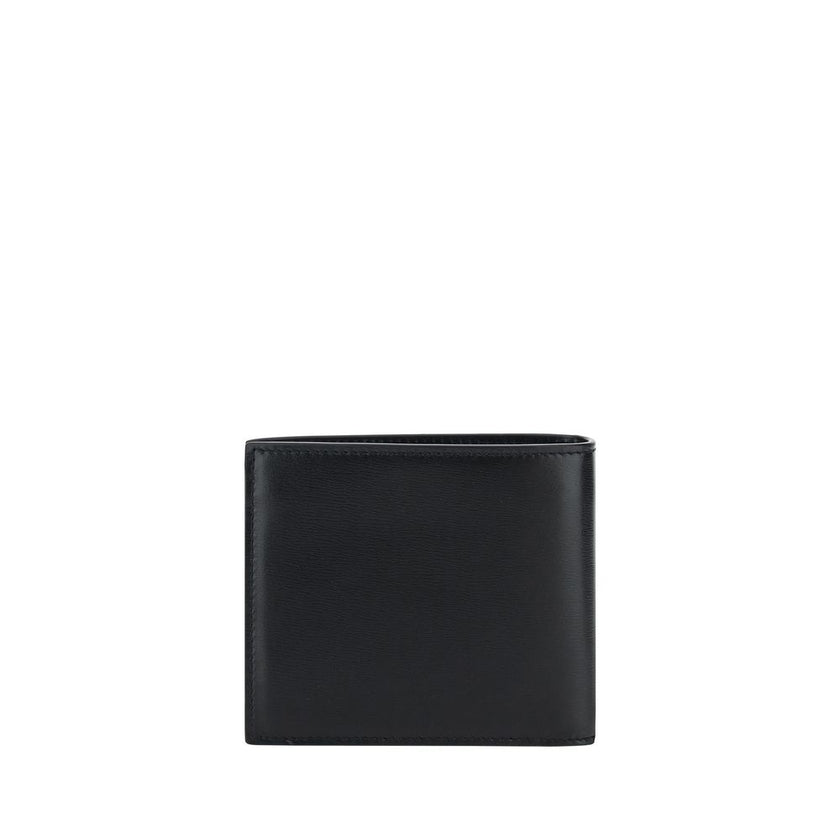 Black Calf Leather Bos Taurus WalletThe Saint Laurent Leather Wallet is a stylish and compact accessory perfect for everyday use. Made of high-quality leather, it features an essential billfold design embellished with the iconic YSL logo embossed on the f