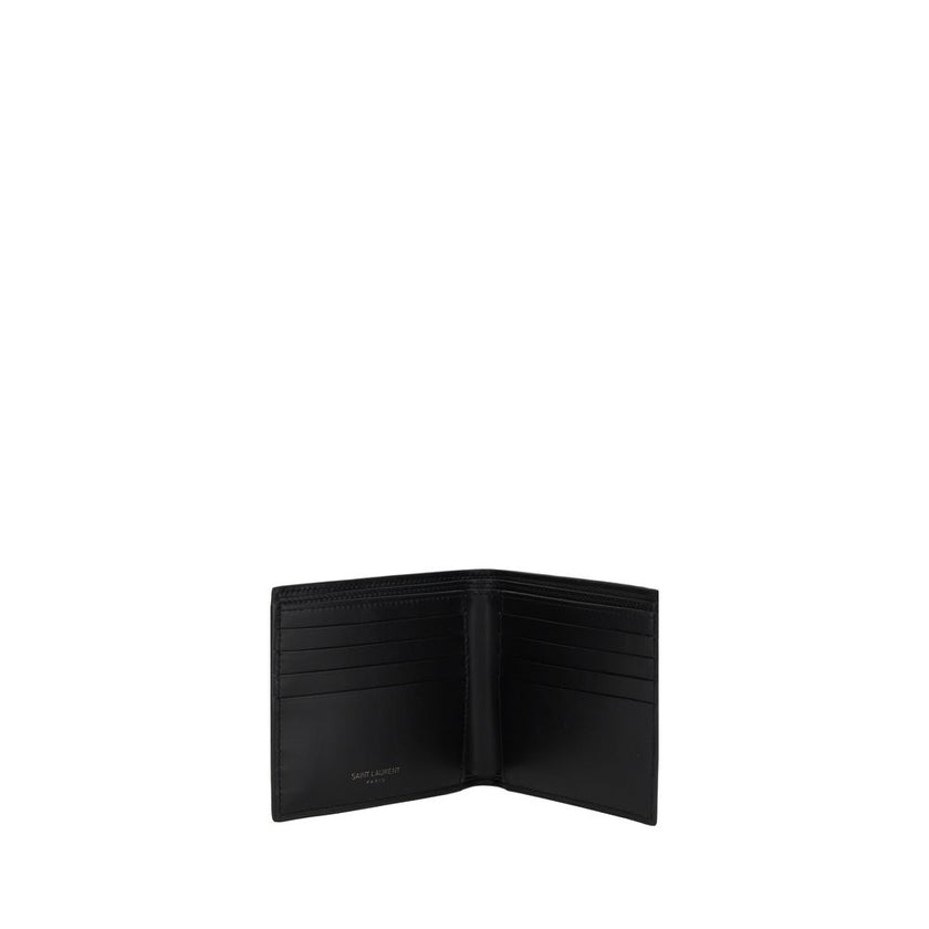 Black Calf Leather Bos Taurus WalletCalfskin Wallet by Saint Laurent, logo plaque on front, bill fold design, internal card slots and bill compartments. Season: AW25 Dimension: 11×11 Composition: 100% Calf Leather Bos Taurus MADE IN ITALYBlack Calf Leathe