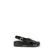 Mae SandalsThe Mae Sandals by Chloé, crafted from smooth calfskin, combine elegance and comfort thanks to the anatomical insole designed to last all day. The upper is characterized by crossed straps and an adjustable ankle strap, secured by the iconic Pad