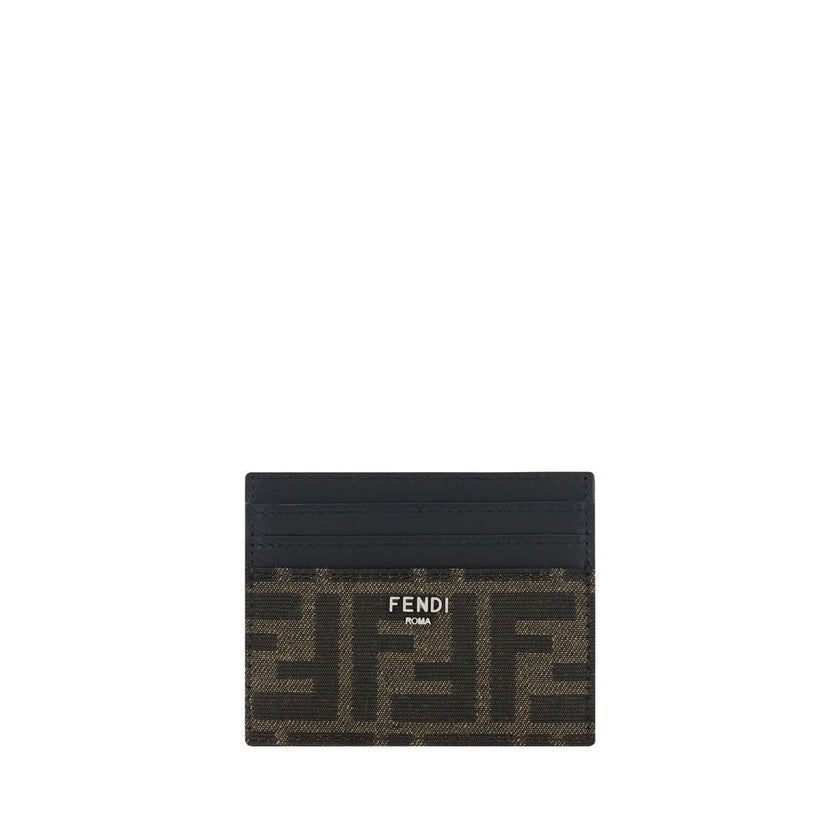 Brown Calf Leather Bos Taurus WalletThe Fendi Leather Card Holder is an elegant and practical accessory, perfect for those seeking a touch of luxury in their everyday life. It features card slots on the front and back, offering ample space to organize car