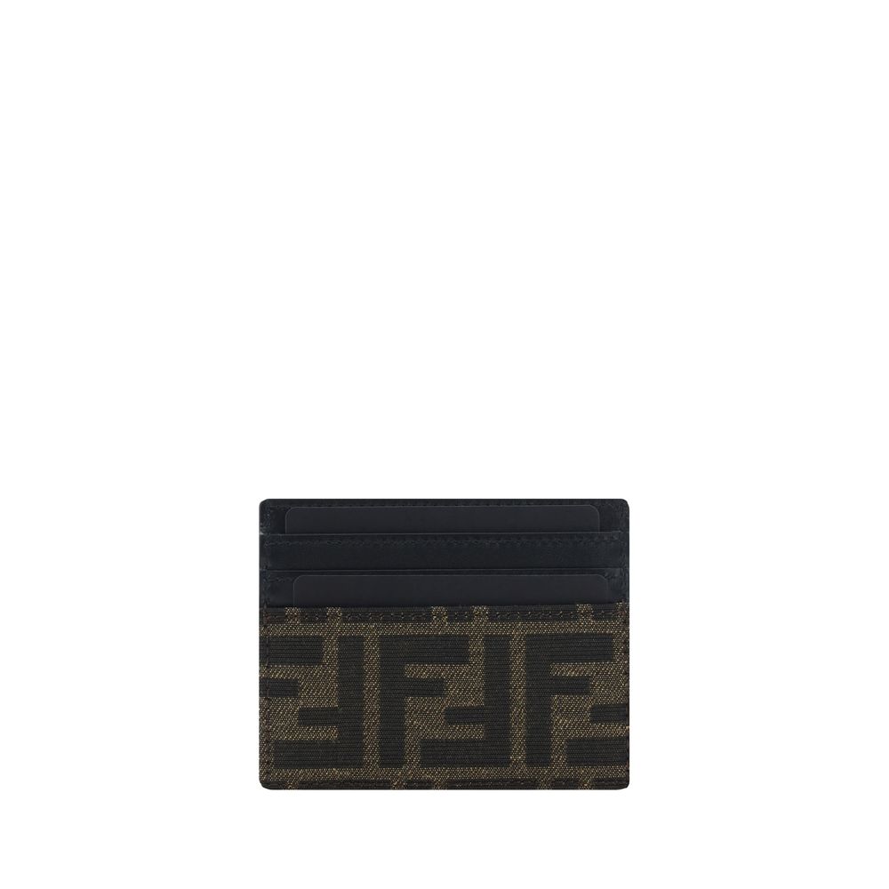Brown Calf Leather Bos Taurus WalletThe Fendi Leather Card Holder is an elegant and practical accessory, perfect for those seeking a touch of luxury in their everyday life. It features card slots on the front and back, offering ample space to organize car