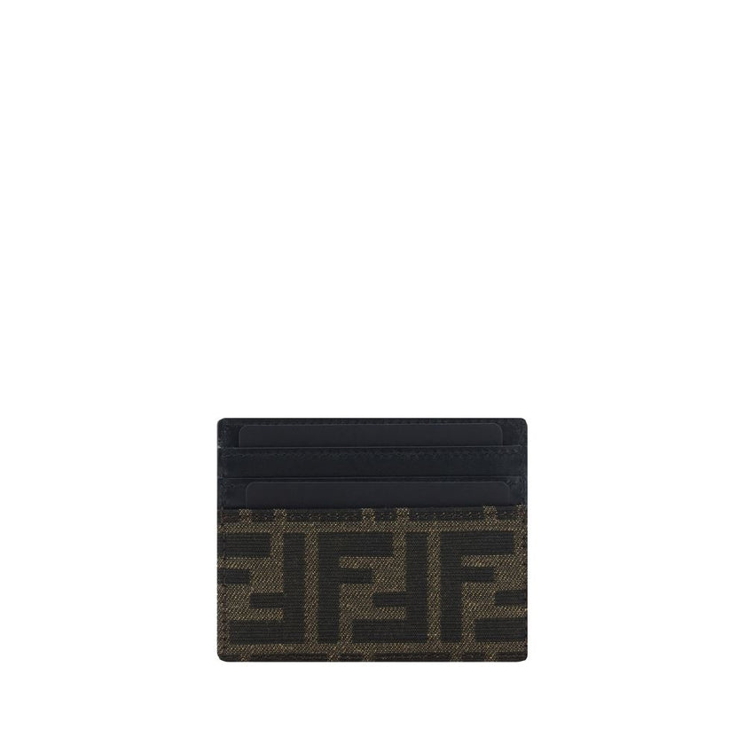 Brown Calf Leather Bos Taurus WalletThe Fendi Leather Card Holder is an elegant and practical accessory, perfect for those seeking a touch of luxury in their everyday life. It features card slots on the front and back, offering ample space to organize car