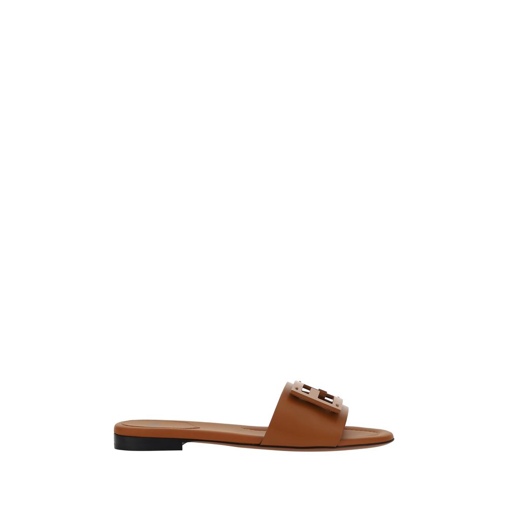 Brown Calf Leather Bos Taurus Flat SandalsCalfskin FF Sandals by Fendi, open toe, three-dimensional plaque with iconic FF logo on front, slip-on style. Season: AW25 Composition: UPPER 100% Calf Leather Bos Taurus SOLE 100% Rubber MADE IN ITALYBrown Calf L