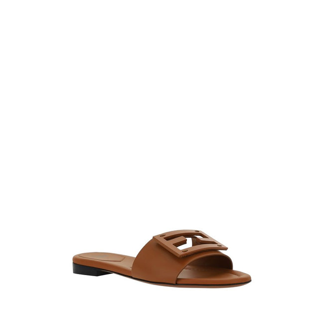 Brown Calf Leather Bos Taurus Flat SandalsCalfskin FF Sandals by Fendi, open toe, three-dimensional plaque with iconic FF logo on front, slip-on style. Season: AW25 Composition: UPPER 100% Calf Leather Bos Taurus SOLE 100% Rubber MADE IN ITALYBrown Calf L