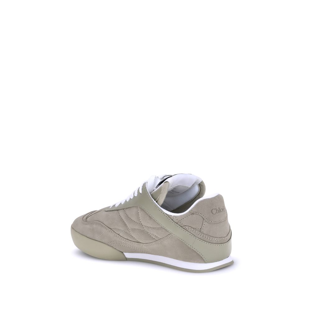 Beige Calf Leather Bos Taurus Low Top SneakersThe Kick Suede Sneakers by Chloé combine style and comfort. They feature a round toe and a paneled design that creates a dynamic visual effect. Suede details add a refined texture, while the front lace-up clos