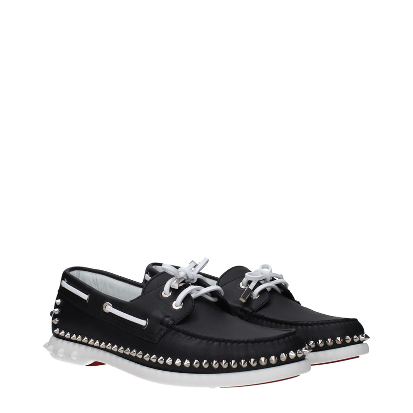 Black Leather Slip-On LoafersDescription: The product with MPN 3240230BK65 and code F82529 leather in black is a loafers designed by Louboutin. It has features like studs. Additional Info: Closing type: Lace up Closure Shoe sole: Rubber Shoe tip: Round to