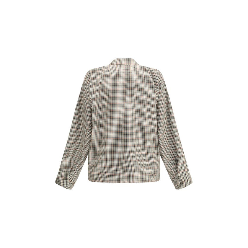 Multicolor Cotton CoatBalenciaga’s Zip Shirt is made of checked cotton flannel and features an overshirt design with a contemporary style. Featuring a classic collar, a double-slider zipper closure, two chest flap pockets and two slit pockets, it is compl