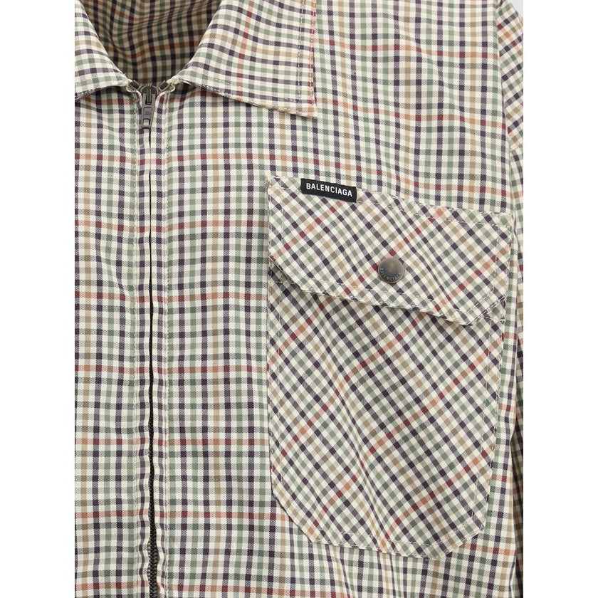 Multicolor Cotton CoatBalenciaga’s Zip Shirt is made of checked cotton flannel and features an overshirt design with a contemporary style. Featuring a classic collar, a double-slider zipper closure, two chest flap pockets and two slit pockets, it is compl