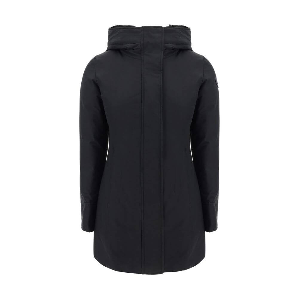 Black Nylon ParkaBoulder Down Jacket by Woolrich, front zipper closure with concealed snap buttons, faux fur-lined hood design, elastic ribbed cuffs, padded and quilted inner lining design, buttoned welt pockets, brand’s iconic logo patch applied on left