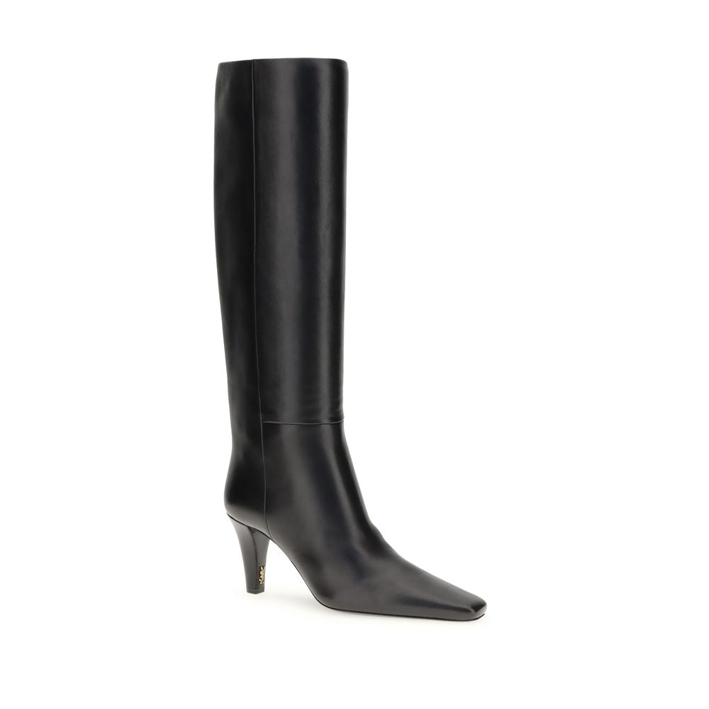 Black Leather High Heel BootsSaint Laurent’s High Leather Boots embody a bold and refined style. With knee-high height and a slightly squared toe, they stand out for their modern, minimalist design. The cone heel adds a touch of character, while the no-lo