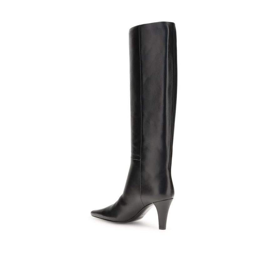 Black Leather High Heel BootsSaint Laurent’s High Leather Boots embody a bold and refined style. With knee-high height and a slightly squared toe, they stand out for their modern, minimalist design. The cone heel adds a touch of character, while the no-lo
