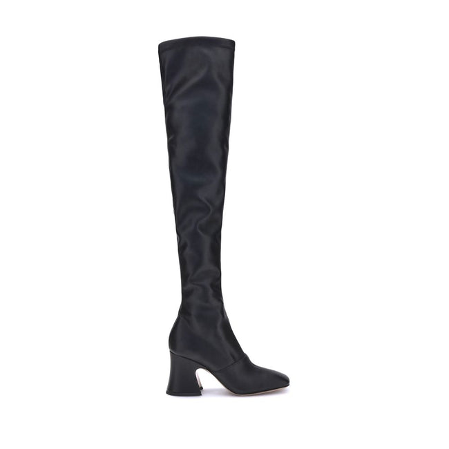 High leather BootsChloé’s High leather Boots stand out for their bold, contemporary design. With a height that reaches mid-thigh, they feature an asymmetrical heel and a squared toe that enhance their modern style. The side zipper ensures a practical and