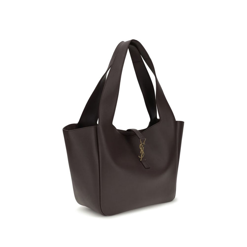 Brown Lamb Ovis Aries Aries Shoulder BagThe Saint Laurent Le 5 à 7 Shoulder Bag is crafted from refined grained leather, featuring a lightweight construction and luxurious tonal suede lining. The East/West design ensures spaciousness and functionality, en