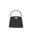 Black Calf Leather Bos Taurus HandbagFerragamo’s Studio Box Bag combines structured elegance and iconic details of the Maison. With trapezoid lines and a ladylike allure, it is embellished with rounded stitching on the front and the Gancini slider closure