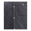 Reversible quilted nylon JacketBurberry’s reversible quilted nylon Jacket combines functionality and distinctive style in one versatile piece. One side features a solid-color quilted nylon fabric, while the other features the classic Burberry Check patter