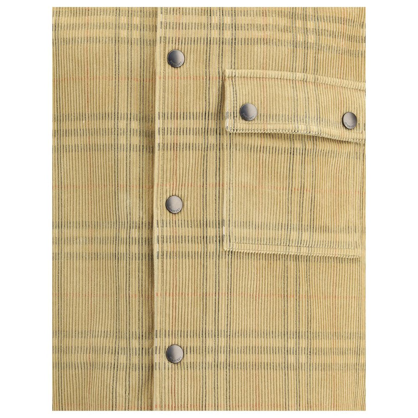 Beige Denim ShirtThis corduroy Shirt featuring Burberry’s iconic Burberry Check combines tradition with contemporary style. Featuring a snap-button closure and a point collar, it also features a snap-button flap chest pocket for a functional touch. Snap-b