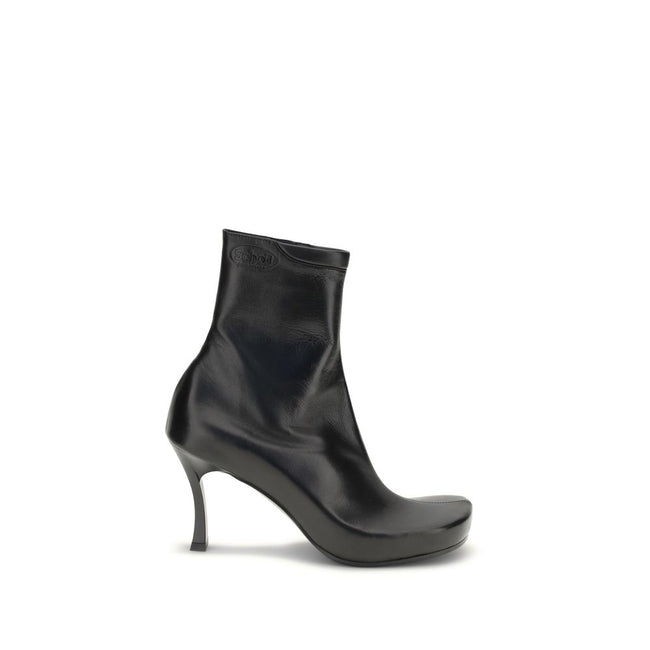 Black Calf Leather Bos Taurus Ankle BootsThe Balenciaga X Scholl Ankle Boots combine style and comfort, crafted from smooth sheepskin with a square toe and internal zip fastening. The upper is embellished with the embossed Scholl and Balenciaga logos, the