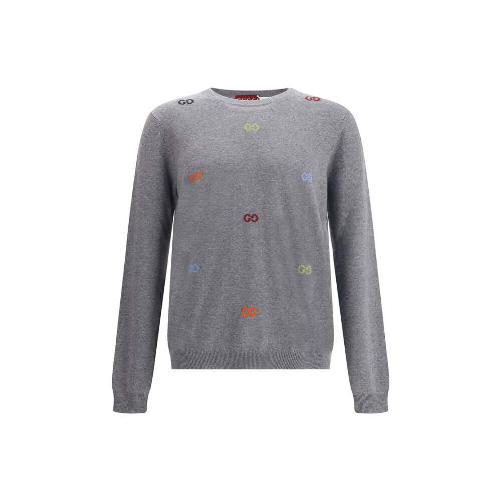 Gray Cashmere SweatshirtGucci’s cashmere Sweater combines bold style and craftsmanship. Made from soft wool, it features a ribbed crew neck, cuffs and hem, and is decorated with the iconic all-over multicolor jacquard logo for a distinctive and recognizab