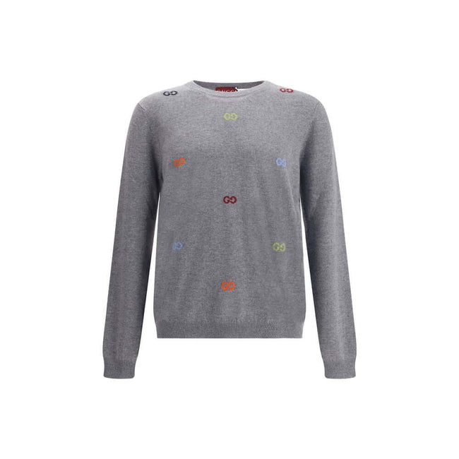 Gray Cashmere SweatshirtGucci’s cashmere Sweater combines bold style and craftsmanship. Made from soft wool, it features a ribbed crew neck, cuffs and hem, and is decorated with the iconic all-over multicolor jacquard logo for a distinctive and recognizab