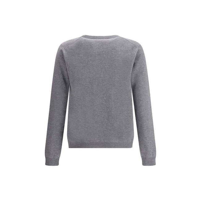 Gray Cashmere SweatshirtGucci’s cashmere Sweater combines bold style and craftsmanship. Made from soft wool, it features a ribbed crew neck, cuffs and hem, and is decorated with the iconic all-over multicolor jacquard logo for a distinctive and recognizab