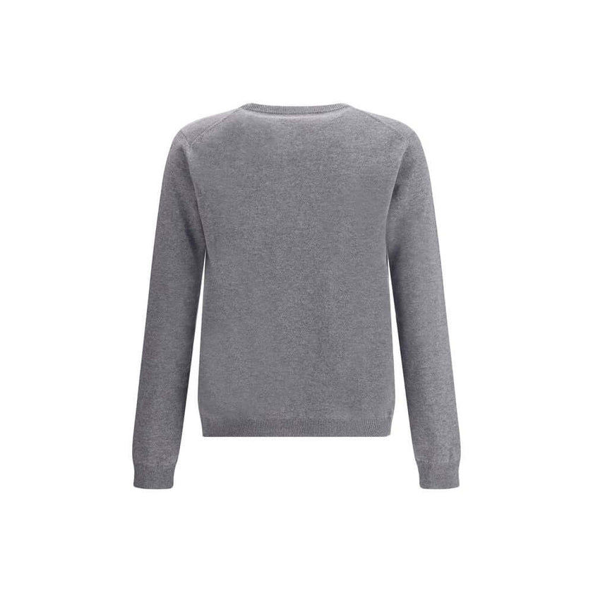 Gray Cashmere SweatshirtGucci’s cashmere Sweater combines bold style and craftsmanship. Made from soft wool, it features a ribbed crew neck, cuffs and hem, and is decorated with the iconic all-over multicolor jacquard logo for a distinctive and recognizab