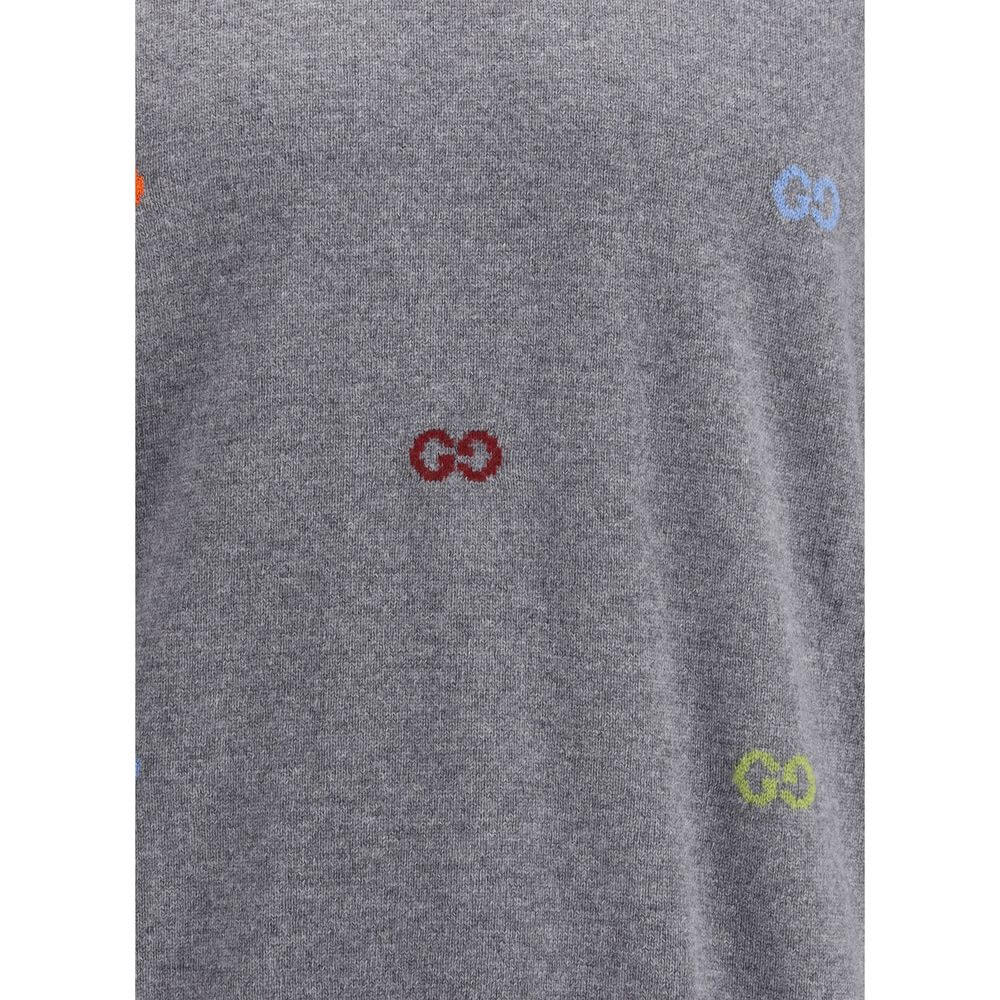 Gray Cashmere SweatshirtGucci’s cashmere Sweater combines bold style and craftsmanship. Made from soft wool, it features a ribbed crew neck, cuffs and hem, and is decorated with the iconic all-over multicolor jacquard logo for a distinctive and recognizab
