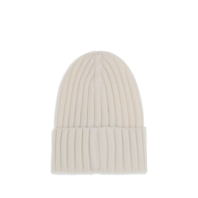 Wool beanie HatMoncler’s wool beanie Hat combines functionality and style in a ribbed design with a modern character. Soft and warm, it is ideal for facing cold days with comfort and personality. A stitched ion logo patch stands out on the front, giving i