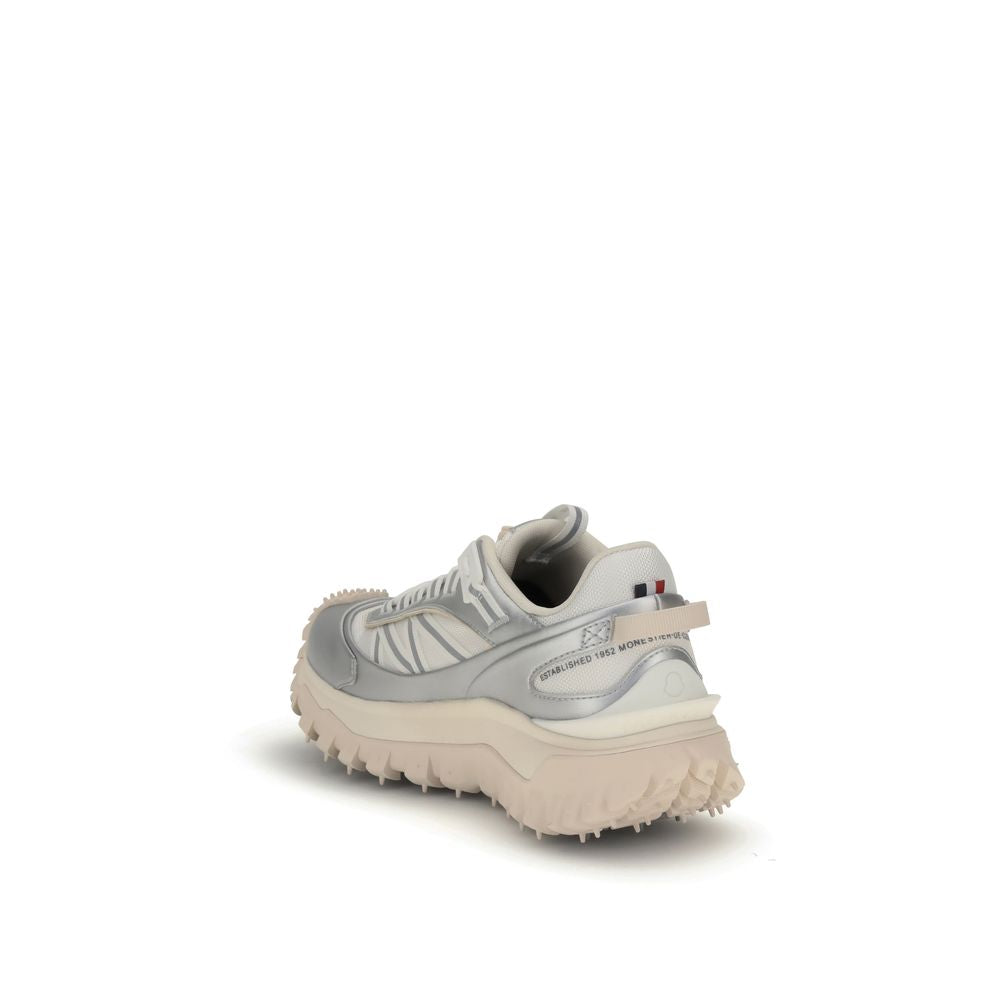 Cream Calf Leather Bos Taurus Athletic SneakersThe Moncler Trailgrip GTX low-top Sneakers combine technical performance and contemporary style. Crafted from fabric and leather with reflective inserts, they feature a logo print on the back and an embossed